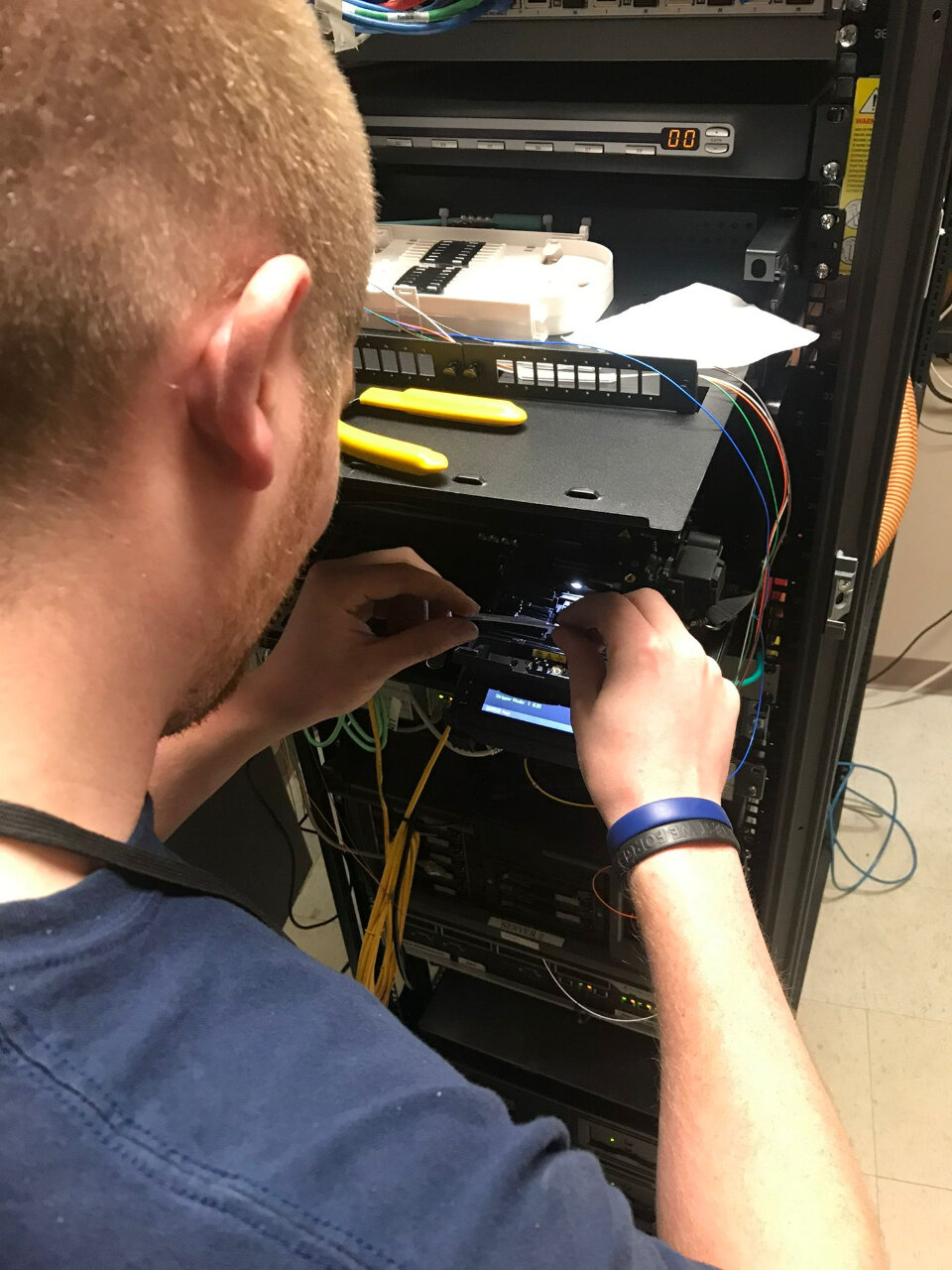 TEFLINK technician completing network and security installation work